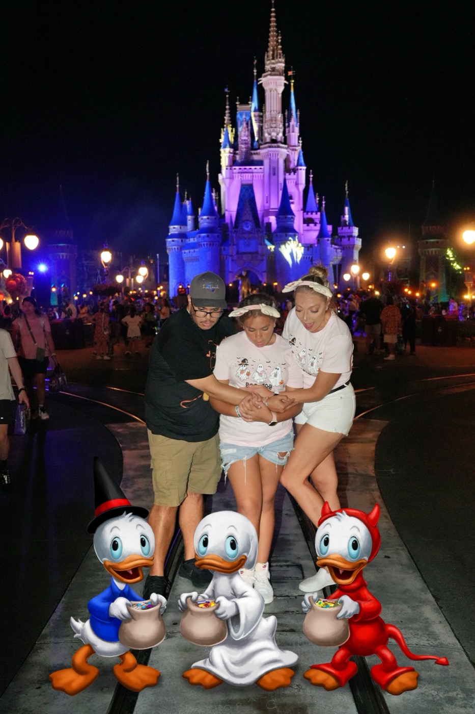 The family in front of Cinderella Castle at Mickey's Not-So-Scary Halloween Party